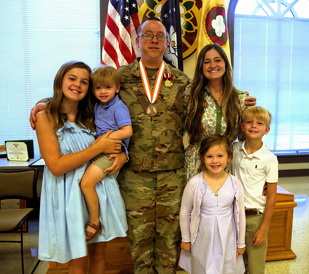 U.S. Army Lt. Col. Charles Baxter, 184th Expeditionary Sustainment Command (ESC), Mississippi Army National Guard, retires after 24 years of service