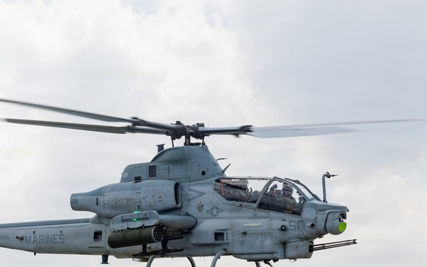 HMLA-367 flies over South Korea