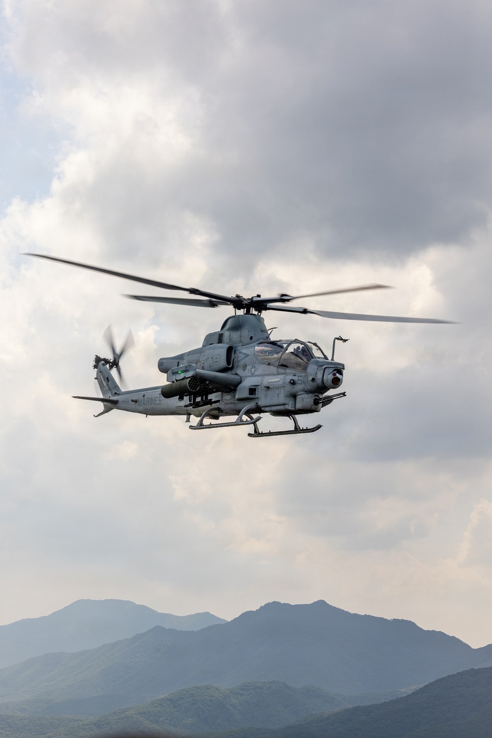 HMLA-367 flies over South Korea