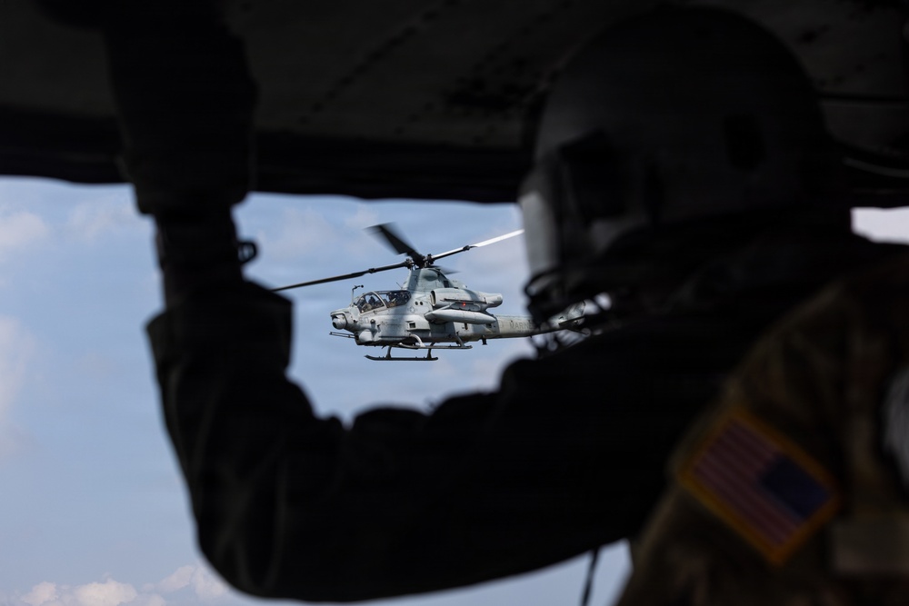 HMLA-367 flies over South Korea