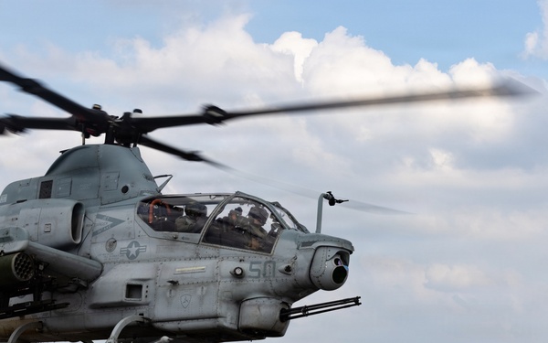 HMLA-367 flies over South Korea