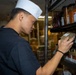 Delbert D. Black Prepares Meal for the Crew