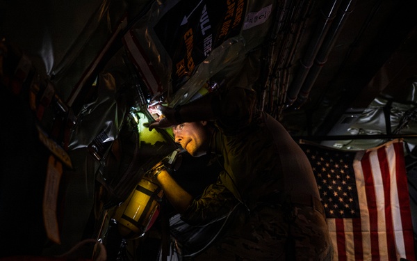 U.S. Air Force KC135 supports U.S. Navy F/A 18 during air refueling