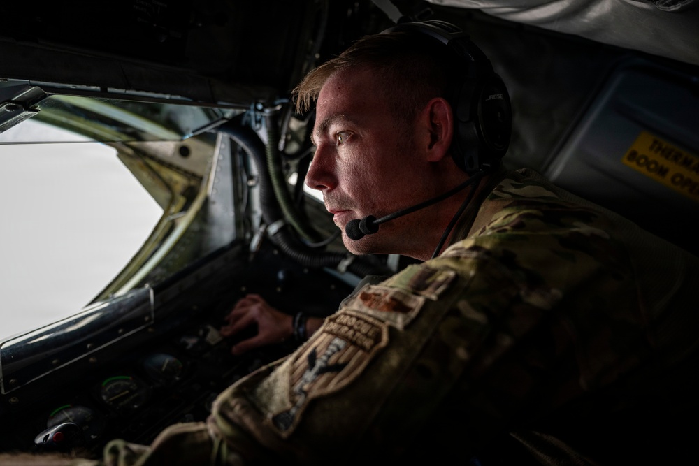 U.S. Air Force KC135 supports U.S. Navy F/A 18 during air refueling