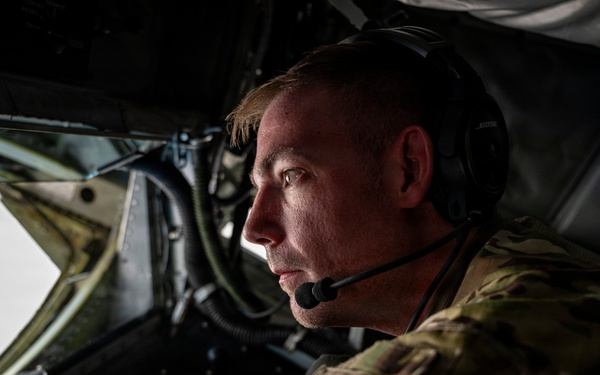 U.S. Air Force KC135 supports U.S. Navy F/A 18 during air refueling