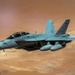 U.S. Air Force KC135 supports U.S. Navy F/A 18 during air refueling