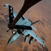 U.S. Air Force KC135 supports U.S. Navy F/A 18 during air refueling