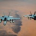 U.S. Air Force KC135 supports U.S. Navy F/A 18 during air refueling