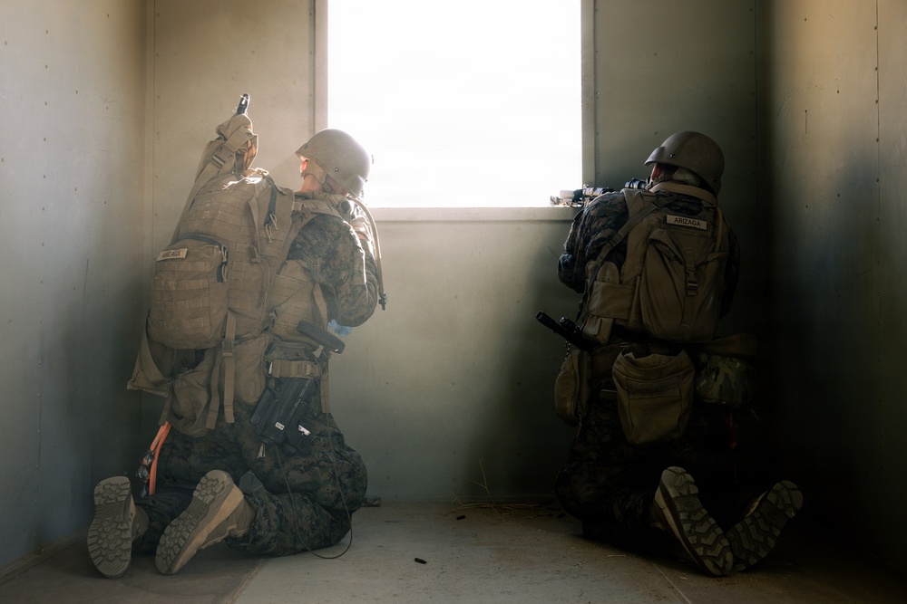 U.S. Marines with 2nd Bn., 1st Marines, rehearse platoon attacks during AFX