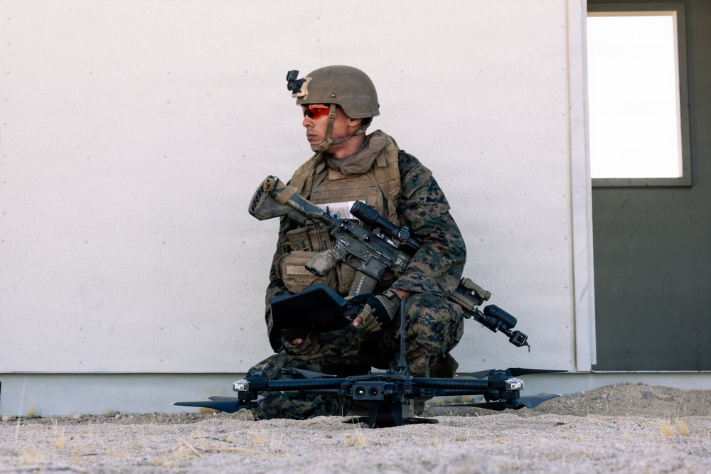 U.S. Marines with 2nd Bn., 1st Marines, rehearse platoon attacks during AFX