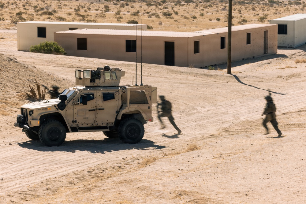 U.S. Marines with 2nd Bn., 1st Marines, rehearse platoon attacks during AFX