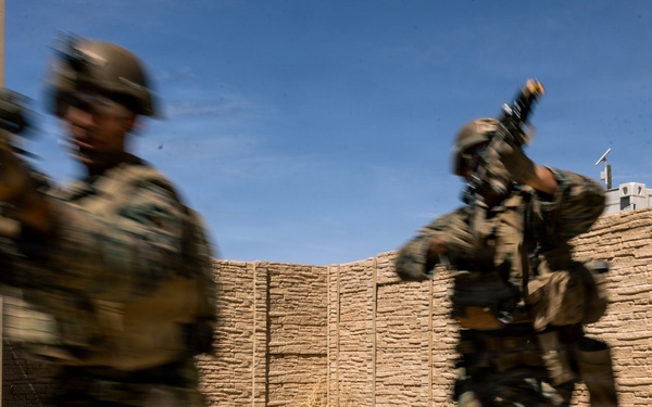 U.S. Marines with 2nd Bn., 1st Marines, rehearse platoon attacks during AFX