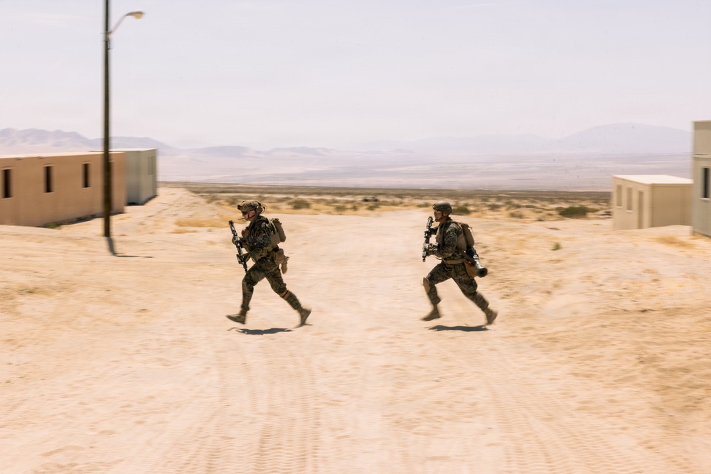 U.S. Marines with 2nd Bn., 1st Marines, rehearse platoon attacks during AFX