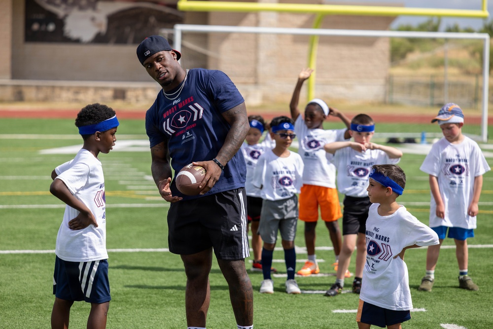 Houston Texans’ Woody Marks pays it forward with pro football camp for youth