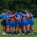 U.S. Coast Guard Women's Rugby Team Huddles After Match