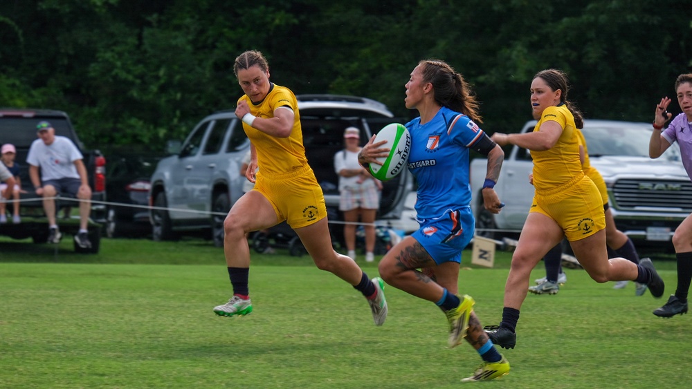 U.S. Coast Guard Women's Rugby Team Advances the Ball Against U.S. Navy