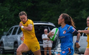 U.S. Coast Guard Women's Rugby Team Advances the Ball Against U.S. Navy