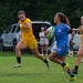 U.S. Coast Guard Women's Rugby Team Advances the Ball Against U.S. Navy