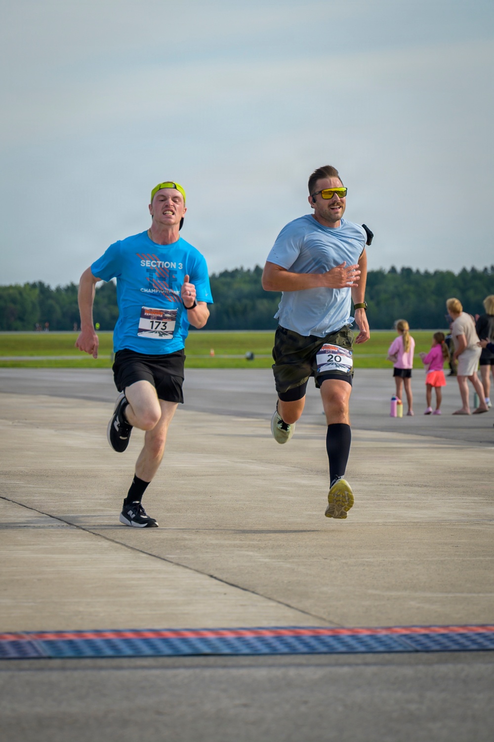 Bottar and Catalano Sprint to Runway 5K Finish Line