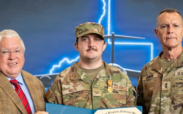 Staff Sgt. Andrew Wolfe is awarded the West Virginia Distinguished Service Medal