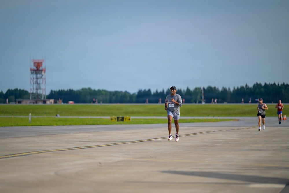 Airman 1st Class Gill Runs the Hancock Field Runway