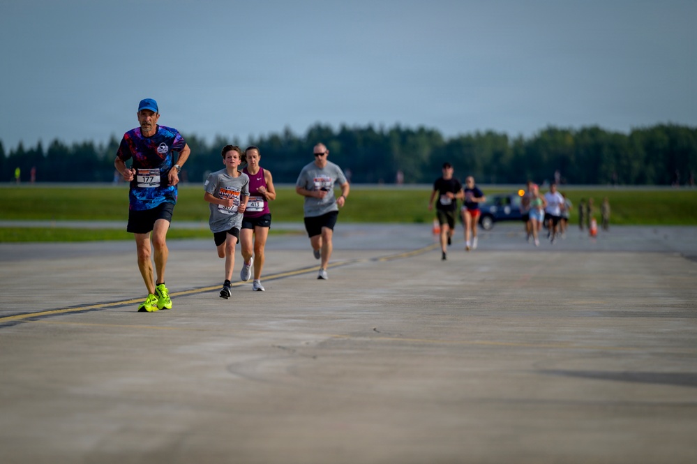 Runners Push Toward Runway 5K Finish Line