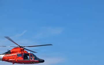 U.S. Coast Guard MH-65 Dolphin Helicopter 6511 in Flight