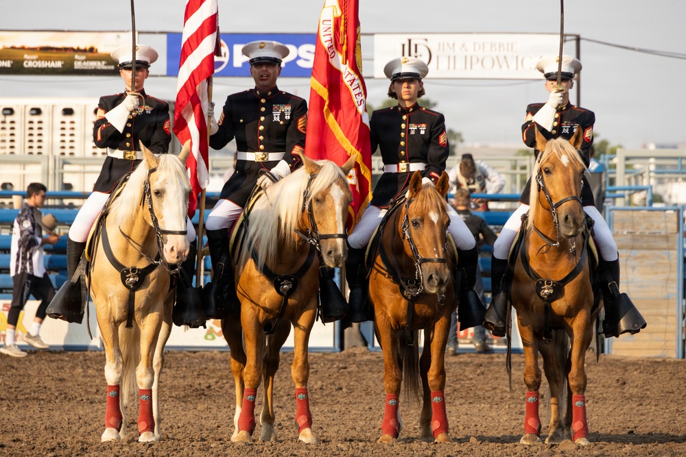 U.S. Marine Corps Mounted Color Guard presents the colors for Big Sky Pro Rodeo