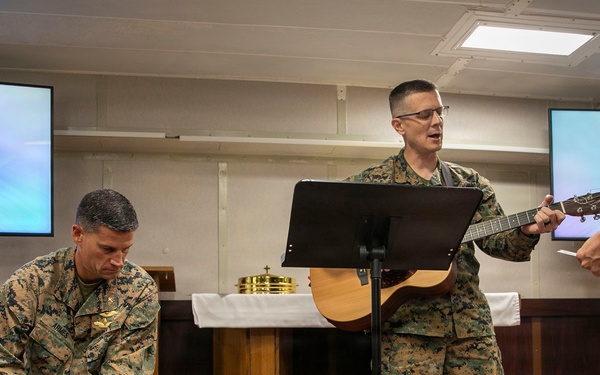U.S. Marines and U.S. Navy Sailors Attend Church Service