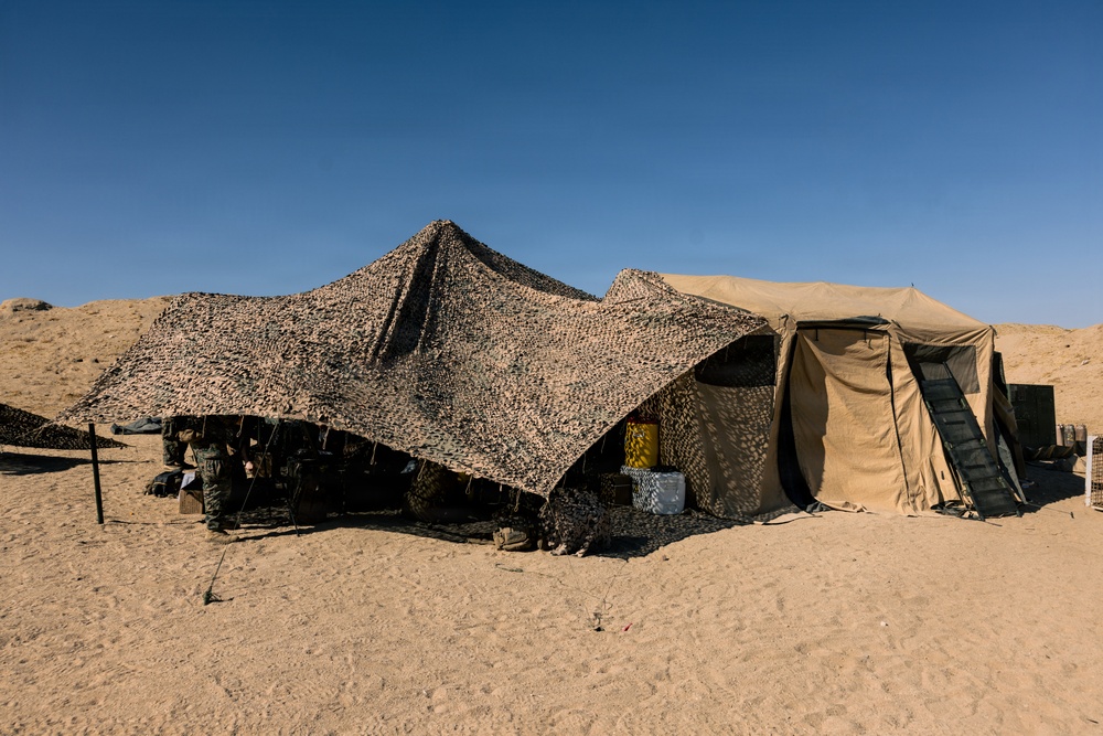 Marines with 2nd Bn., 1st Marines, visit the athletic trainer during AFX