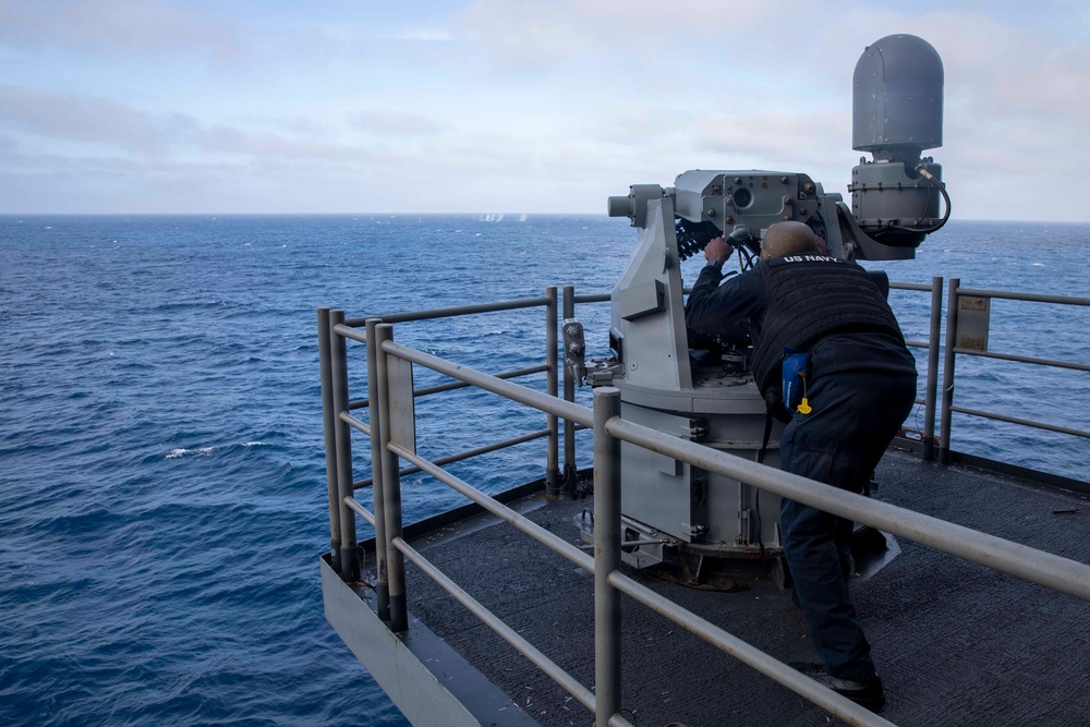 Aviation Ordnanceman Fires MK 38 - 25 mm Machine Gun System