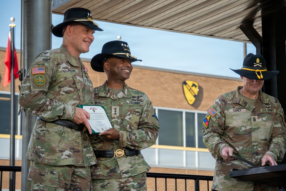 Maj. Gen. Thomas M. Feltey relinquishes command of the 1st Cavalry Division