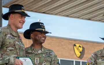 Maj. Gen. Thomas M. Feltey relinquishes command of the 1st Cavalry Division