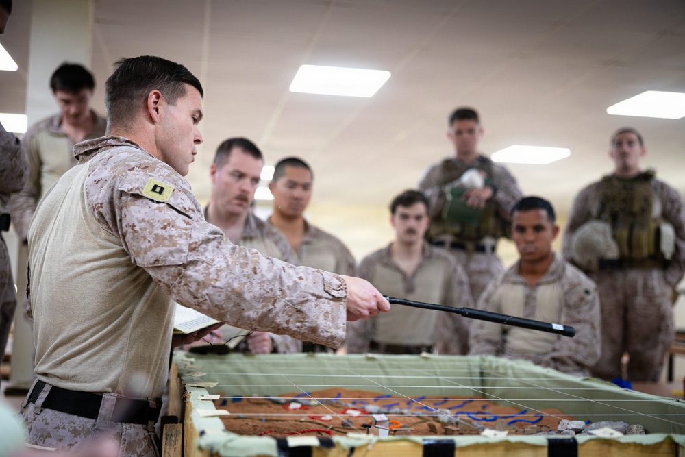 U.S. Marines and Sailors receive an operational order