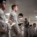 U.S. Marines and Sailors receive an operational order