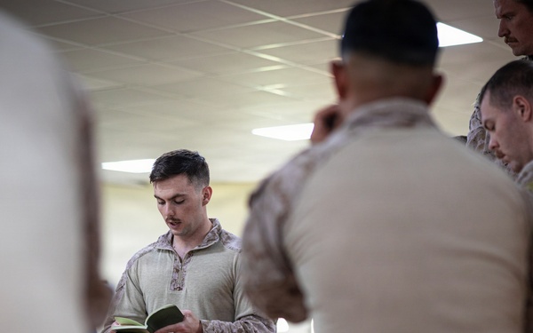 U.S. Marines and Sailors receive an operational order