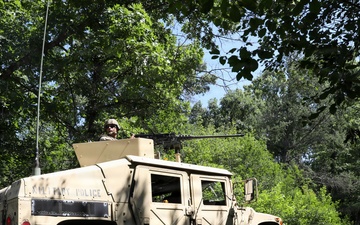 Military police vehicle mounted patrol, wooded area, at WAREX