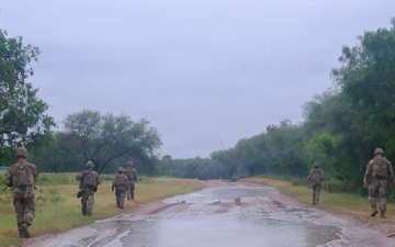 U.S Army Soldiers with the 744th Engineer Company conduct foot patrol along the southern border