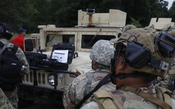 Military police perform mounted patrol during WAREX 26