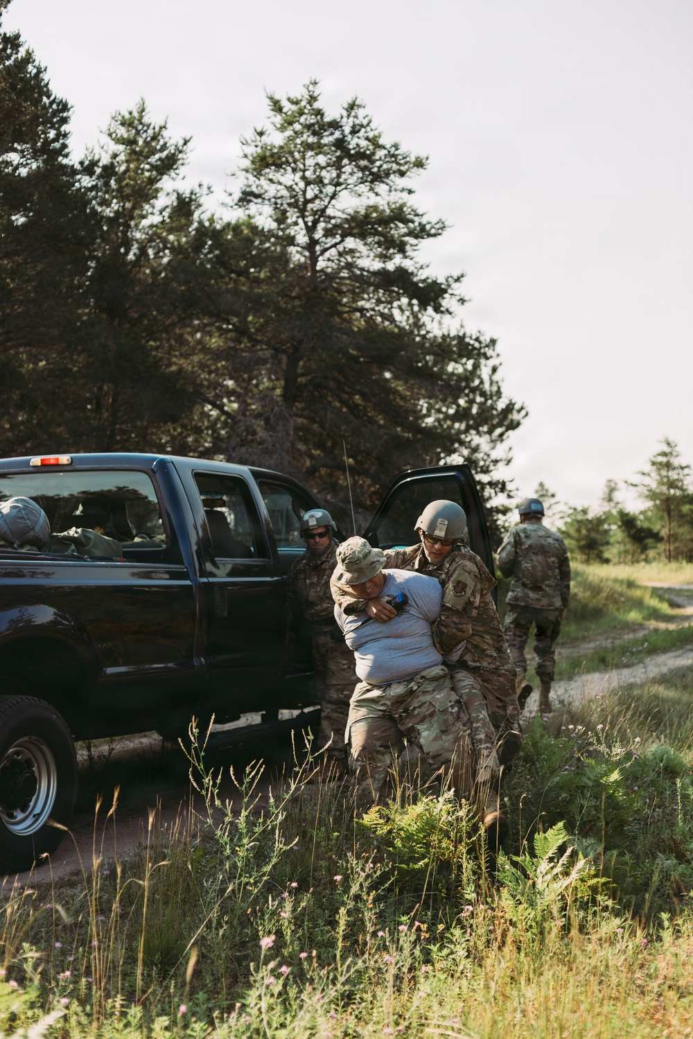 Airmen of the 131st Civil Engineering Squadron and the 139th Civil Engineering Squadron prepare a Forward Opearting Base