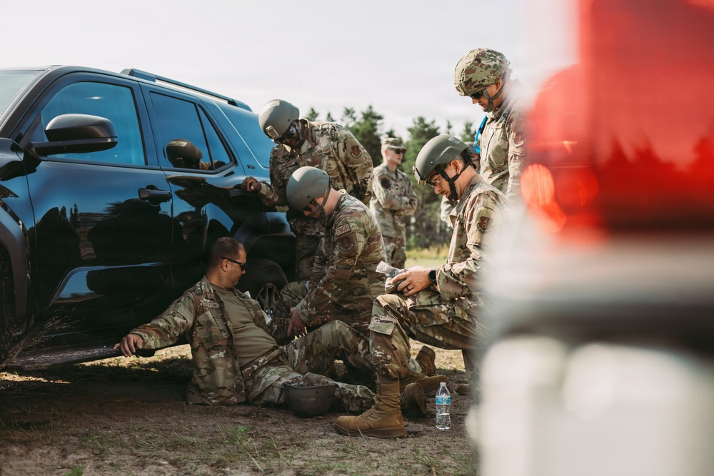 Airmen of the 131st Civil Engineering Squadron and the 139th Civil Engineering Squadron prepare a Forward Opearting Base