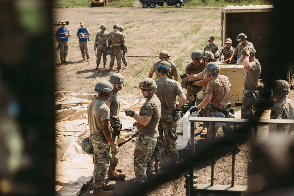 Airmen of the 131st Civil Engineering Squadron and the 139th Civil Engineering Squadron prepare a Forward Opearting Base