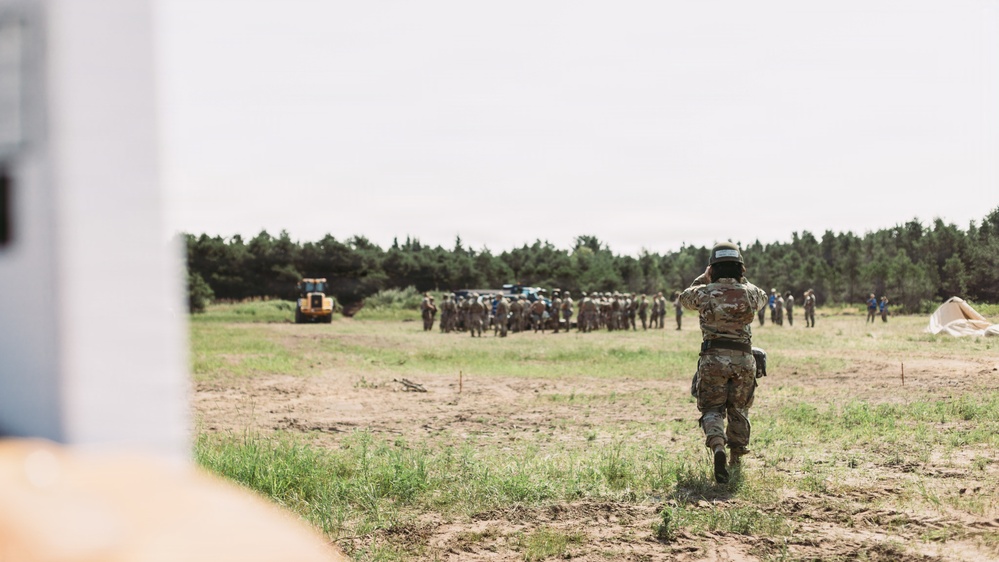 Airmen of the 131st Civil Engineering Squadron and the 139th Civil Engineering Squadron prepare a Forward Opearting Base