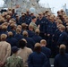 Rear Adm. Christopher Alexander, commander, Naval Surface Force Atlantic (SURFLANT), addresses the crew of USS Ted Stevens (DDG 128).