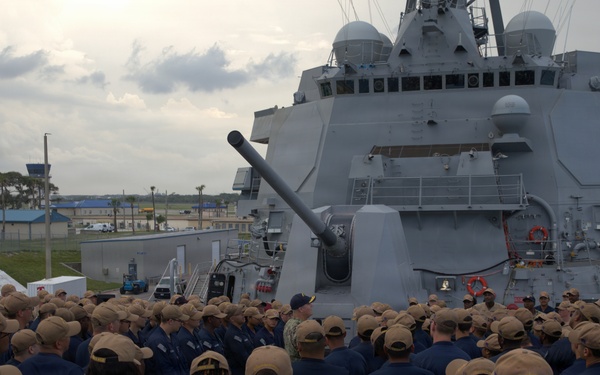 Rear Adm. Christopher Alexander, commander, Naval Surface Force Atlantic (SURFLANT), addresses the crew of USS Ted Stevens (DDG 128).