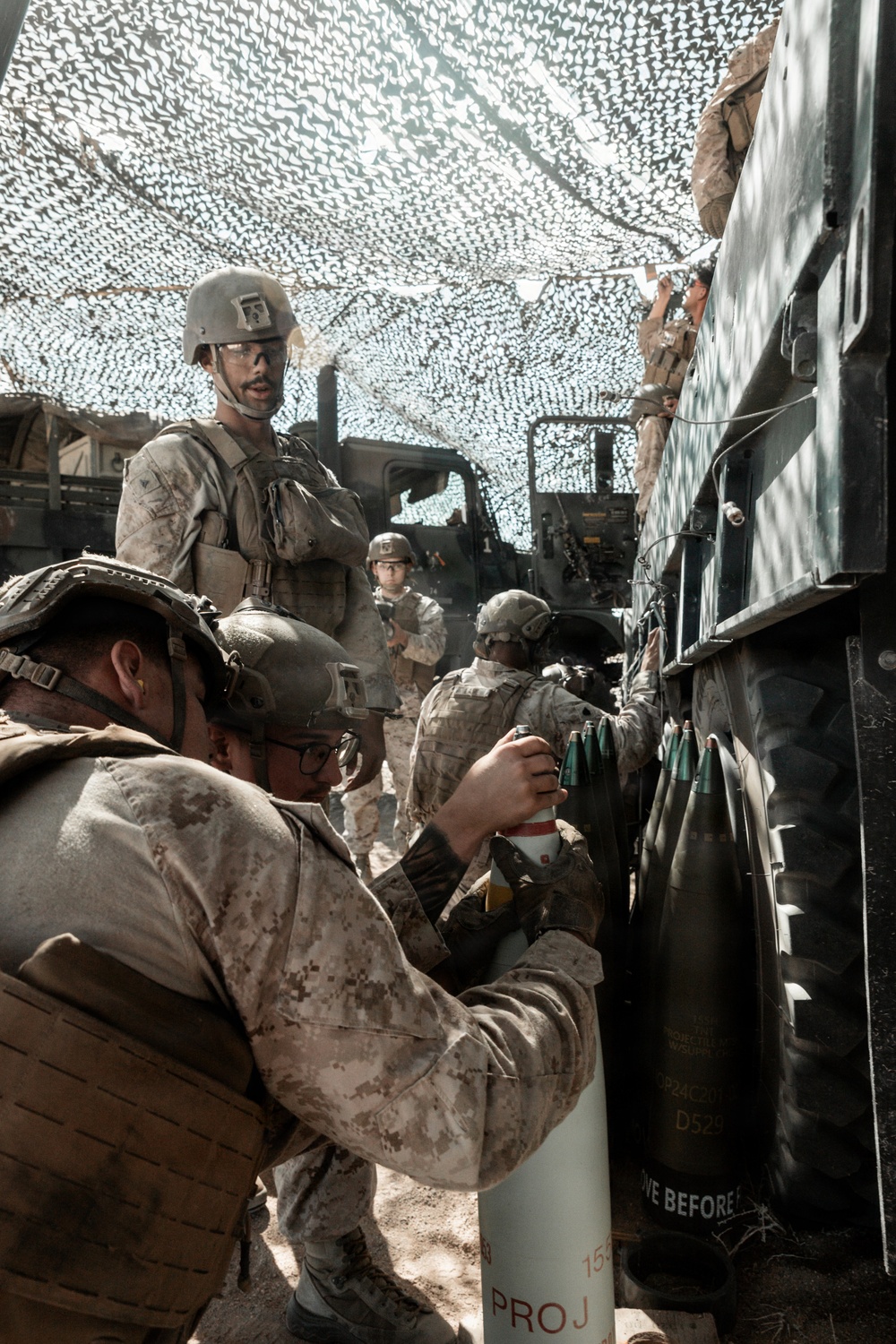 Marines with 3/11 conduct an observation shoot during SLTE 4-26