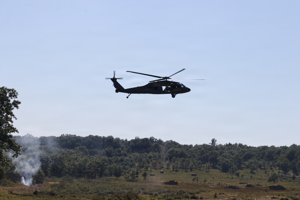 Keeping an eye on a small fire while they fire from above