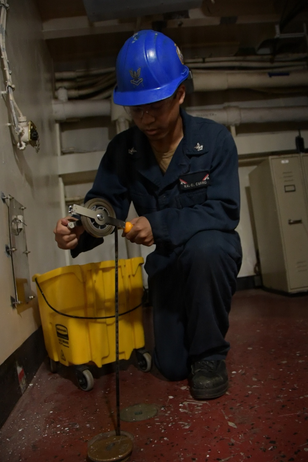 USS John C. Stennis (CVN 74) Sailor Conducts Maintenance