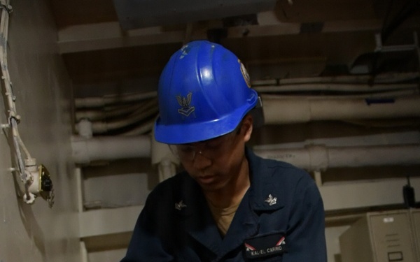 USS John C. Stennis (CVN 74) Sailor Conducts Maintenance