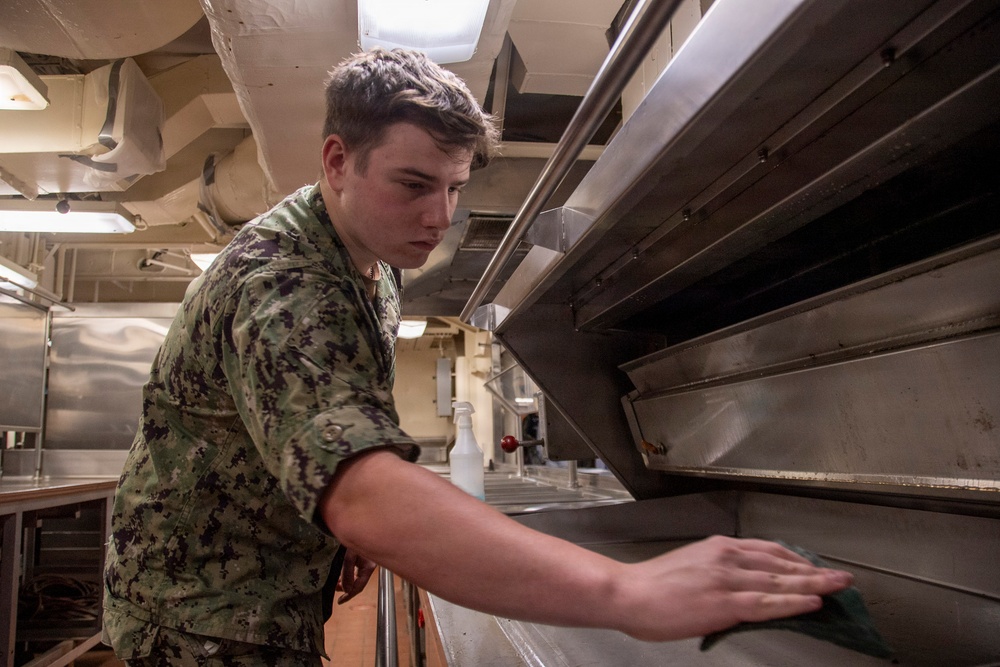 USS John C. Stennis (CVN 74) Sailor Conducts Maintenance